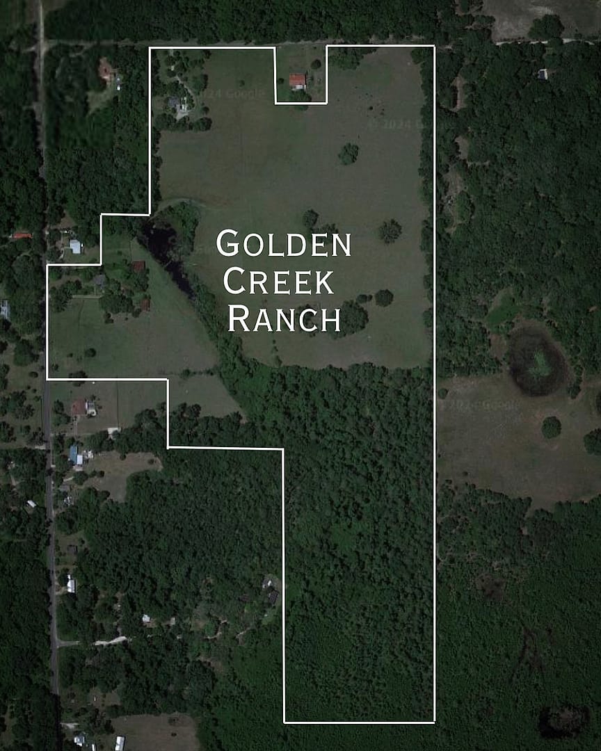 A satellite view of Golden Creek Ranch in Florida, with the property boundaries clearly outlined, showcasing the expansive land area of the ranch.